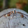 Adjustable leather bracelet with sliding knot and silver plated zamak dragonfly connector