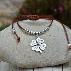 Adjustable leather choker with four-leaf clover pendant