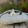 Adjustable leather bracelet with whale or mermaid tail in silver plated zamak.