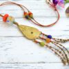 Long leather necklace with golden African pendant and recycled glass beads