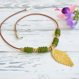 Choker necklace with rustic African golden leaf-shaped African pendant and green recycled glass beads