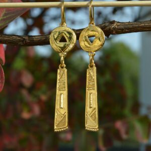 Ethnic long earrings with circle and gold plated zamak stick and hippie clasp